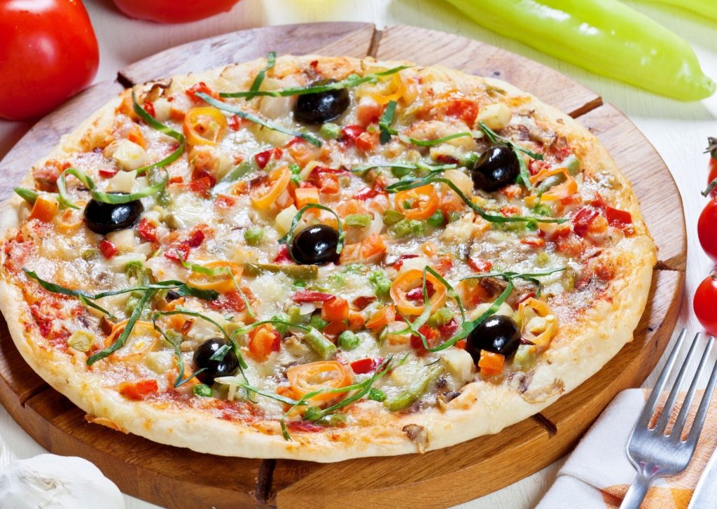 Pizza vegetariana con harina y arroz integral